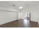 Main bedroom with ceiling fan and access to screened porch at 843 Challenger Ave, Davenport, FL 33897