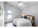 Cozy bedroom with a full-size bed and wood nightstand at 843 Challenger Ave, Davenport, FL 33897