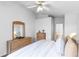 Spacious bedroom with large mirror and dresser at 843 Challenger Ave, Davenport, FL 33897