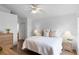 Bright bedroom with a queen-size bed and wood dresser at 843 Challenger Ave, Davenport, FL 33897