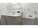 Laundry room with washer, dryer, and utility sink at 843 Challenger Ave, Davenport, FL 33897