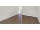 Spacious living room with hardwood floors and ample natural light at 843 Challenger Ave, Davenport, FL 33897