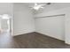 Bright living room with hardwood floors and high ceilings at 843 Challenger Ave, Davenport, FL 33897