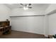 Home office with wood desk and chair, offering ample workspace at 843 Challenger Ave, Davenport, FL 33897