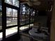 Enclosed patio with table and chairs, overlooking the backyard at 110 Cypress Woods Ct # 5C, Deltona, FL 32725