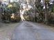 Pathway through lush greenery in Green Springs Park at 110 Cypress Woods Ct # 5C, Deltona, FL 32725