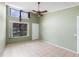 Living room with tile floors and ceiling fan at 1103 Errol Place Cir, Apopka, FL 32712