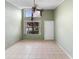 Living room with tile floors and ceiling fan at 1103 Errol Place Cir, Apopka, FL 32712