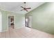 Living room with tile floors and sliding door at 1103 Errol Place Cir, Apopka, FL 32712