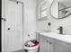 Updated bathroom with modern vanity and fixtures at 1202 Dewey Ave, Orlando, FL 32808