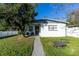 Updated bungalow with a fenced yard and firepit at 1202 Dewey Ave, Orlando, FL 32808