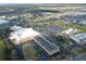 Aerial view of a commercial area featuring stores, parking lots, and landscaping at 1207 Lucaya Cir, Orlando, FL 32824