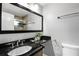 Bathroom with granite countertop and walk-in shower at 1207 Lucaya Cir, Orlando, FL 32824