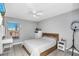 Bedroom with full bed, dresser, and window at 1207 Lucaya Cir, Orlando, FL 32824