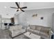 Living room with neutral decor and ceiling fan at 1207 Lucaya Cir, Orlando, FL 32824