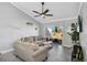 Spacious living room with ceiling fan and backyard access at 1207 Lucaya Cir, Orlando, FL 32824