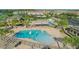 Community pool and water features with surrounding homes at 12755 Oulton Cir, Orlando, FL 32832