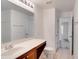 Clean bathroom with vanity, toilet and access to other rooms at 12755 Oulton Cir, Orlando, FL 32832