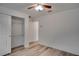 Well-lit bedroom with double closets and ceiling fan at 12755 Oulton Cir, Orlando, FL 32832