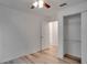 Spacious bedroom with double closets and ceiling fan at 12755 Oulton Cir, Orlando, FL 32832