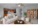 Comfortable living area with an open floor plan, connecting the kitchen and showcasing stylish decor at 12755 Oulton Cir, Orlando, FL 32832