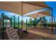 Community playground with shaded play structures at 12755 Oulton Cir, Orlando, FL 32832