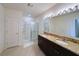 Bathroom boasts double sinks, granite counters, and a shower at 1824 Palmetto Scrub Cir, Port Orange, FL 32128