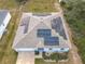 Aerial view showcasing home with solar panels at 208 Goldenrod Ln, Kissimmee, FL 34759