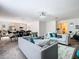 Open concept living and dining space with stylish furniture at 208 Goldenrod Ln, Kissimmee, FL 34759