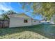 Spacious backyard with grassy area and large tree at 209 Meadow Hills Dr, Sanford, FL 32773