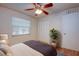 Bedroom featuring a ceiling fan, large closet, and neutral decor at 209 Meadow Hills Dr, Sanford, FL 32773