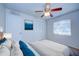 Bright bedroom with ceiling fan, large closet, and bright white walls at 209 Meadow Hills Dr, Sanford, FL 32773