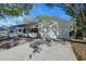Updated single story home with a two car garage and a large driveway at 209 Meadow Hills Dr, Sanford, FL 32773