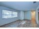 Bright living room with tile floors and large windows at 209 Meadow Hills Dr, Sanford, FL 32773