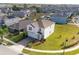 Two-story house with driveway, nestled in a community of homes at 2910 Black Birch Dr, Ocoee, FL 34761