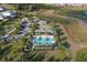 Community pool and clubhouse with ample parking at 2910 Black Birch Dr, Ocoee, FL 34761