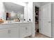 Bright bathroom boasts double vanity and ample storage at 2910 Black Birch Dr, Ocoee, FL 34761