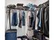 Well-organized walk-in closet with ample shelving and hanging space at 2910 Black Birch Dr, Ocoee, FL 34761