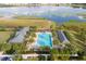 Resort-style community pool with poolside lounging at 2910 Black Birch Dr, Ocoee, FL 34761