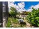 Shady backyard with swing set and space for recreation or relaxation at 3022 Bransbury Ct, Kissimmee, FL 34747