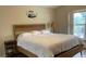 Main bedroom with queen bed and TV at 3022 Bransbury Ct, Kissimmee, FL 34747