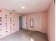 Bedroom featuring a climbing wall, an open doorway, and neutral carpet at 3022 Bransbury Ct, Kissimmee, FL 34747