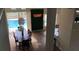 Open dining room overlooking the pool and backyard at 3022 Bransbury Ct, Kissimmee, FL 34747