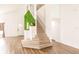 Bright home entrance features a staircase, modern hardwood floors, and unique decorations at 3022 Bransbury Ct, Kissimmee, FL 34747