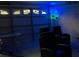 Game room with seating and projector at 3022 Bransbury Ct, Kissimmee, FL 34747