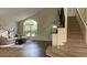 Spacious living room with hardwood floors and large window at 3022 Bransbury Ct, Kissimmee, FL 34747