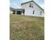 Back of house showing a large yard at 3603 Kariba Ct, Kissimmee, FL 34746