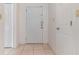 Simple entryway with white door and tile floor at 4392 S Lake Orlando Pkwy # 4, Orlando, FL 32808