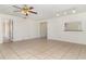 Spacious living room with tile floors and access to kitchen at 4392 S Lake Orlando Pkwy # 4, Orlando, FL 32808