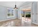 Bright dining area with sliding glass doors to the patio at 5810 Penney Ln, The Villages, FL 32163